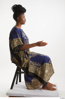 Dina Moses  1 dressed sitting traditional decora long african…